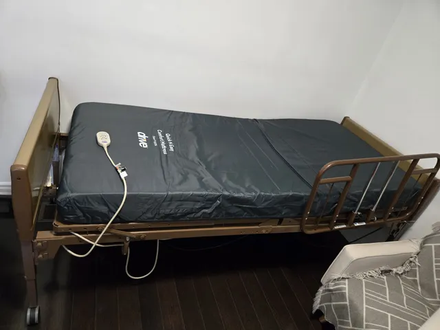 Motorized brown frame comes with 1 brand new Twin XL mattress.  Dimensions: 88”L x 37”W x 26-36”H